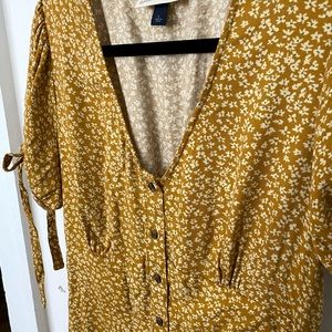 Yellow floral dress with ties and cap sleeves